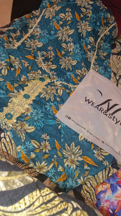 floral-patterned kurti (tunic) in shades of teal