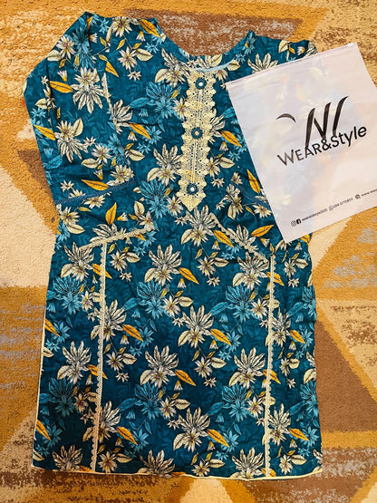 floral-patterned kurti (tunic) in shades of teal