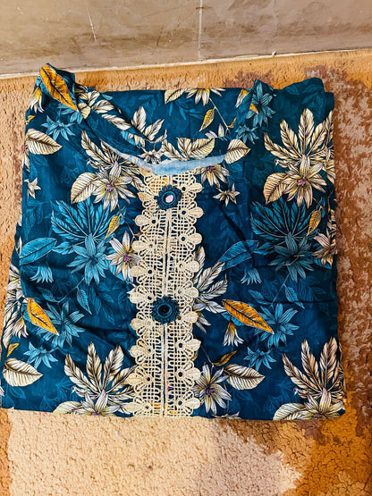 floral-patterned kurti (tunic) in shades of teal